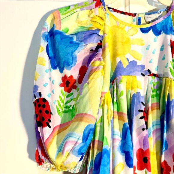 NWT Stella McCartney Kids dress featuring a vibrant, multicoloured print.  Size - Picture 4 of 11